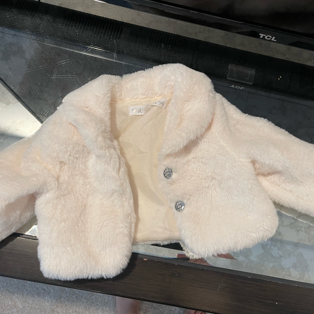 12 month white faux fur coat .